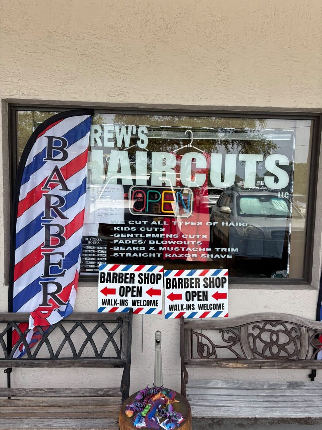 Drew's Haircuts LLC window signage